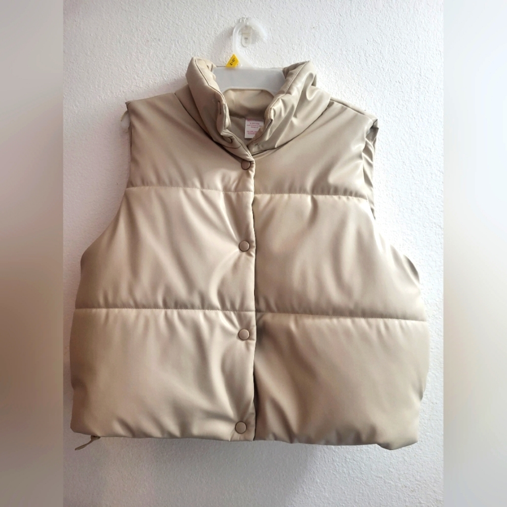 Cream color puffer vest. Women's size L